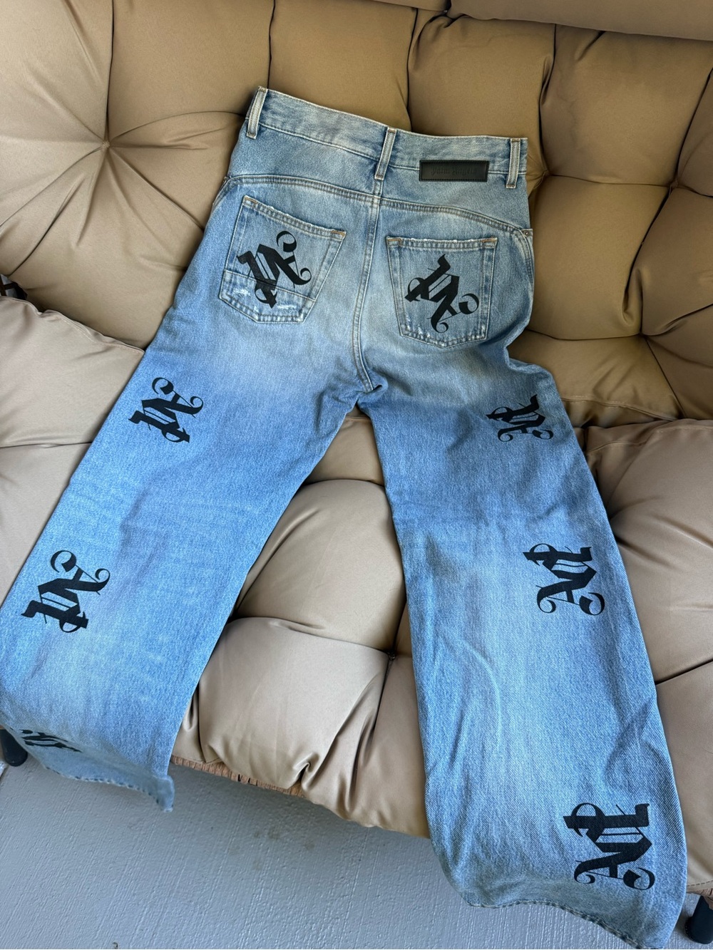 Palm Angels Light Blue Denim Jeans with Black Gothic Logos